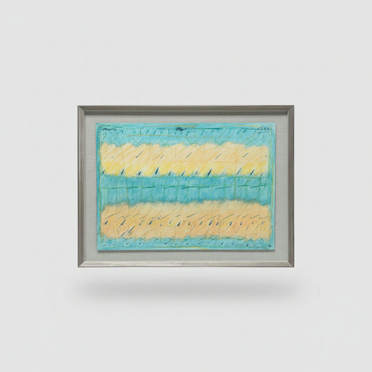 A framed mixed media artwork titled 'Whispers of the Wind' featuring layers of paper in blue and yellow hues, displayed on a wooden floor next to a black sculpture.