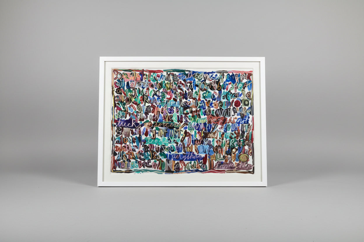 A mixed media artwork on paper titled 'So People Talk' by Jane Gilday, framed in a white custom frame, displayed on a wooden surface with a blurred background.