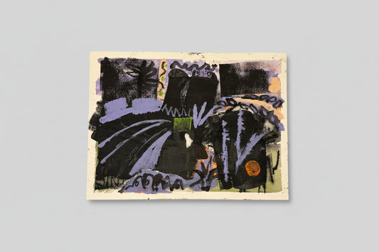 A framed mixed media artwork on paper titled 'Mecca 2', displayed on a wall above a green plant, with a abstract geometric pattern composed of various colors including purple, black, green, and orange.