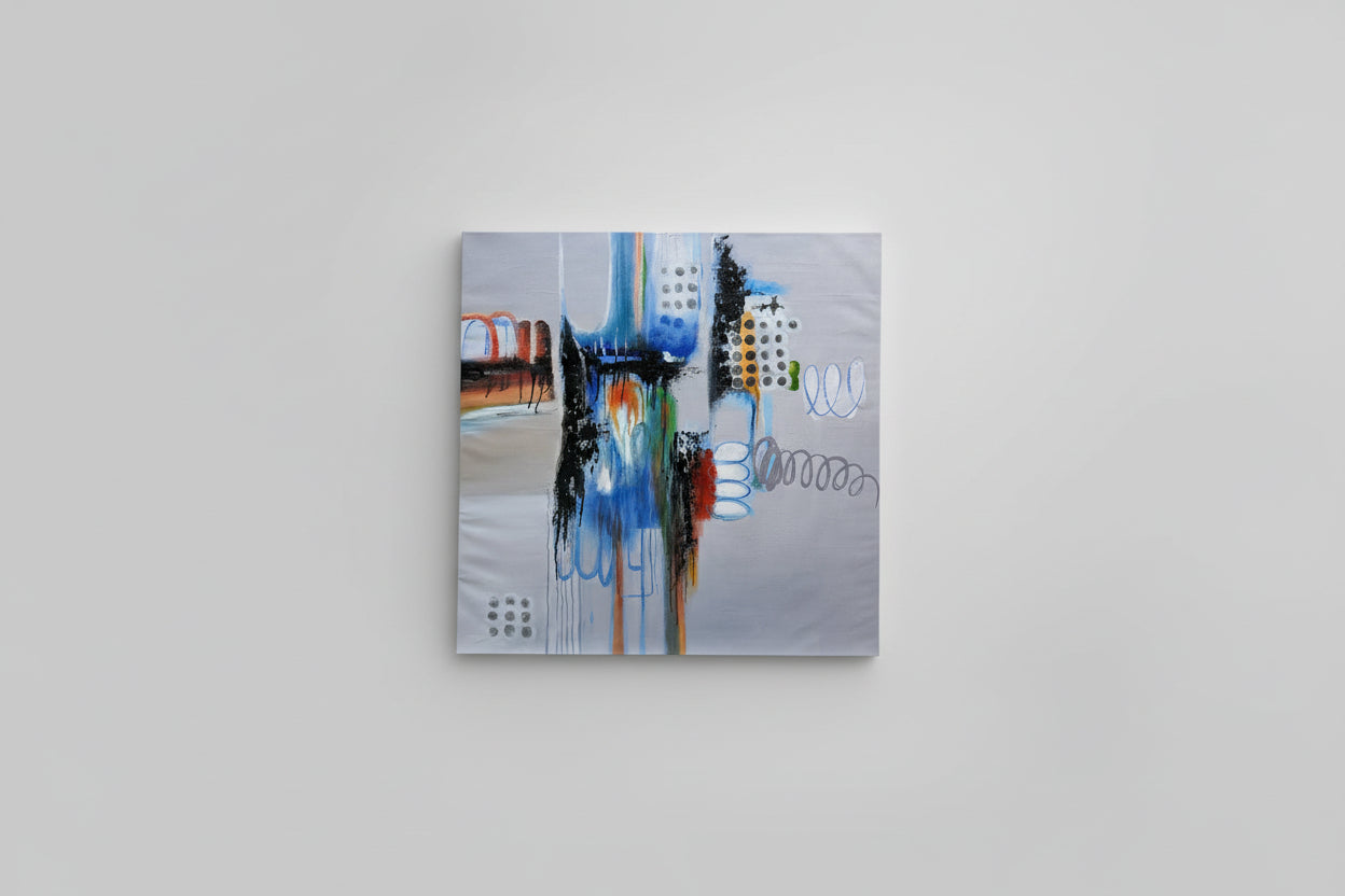Abstract oil painting on canvas with vibrant colors and dynamic shapes displayed on a wall.