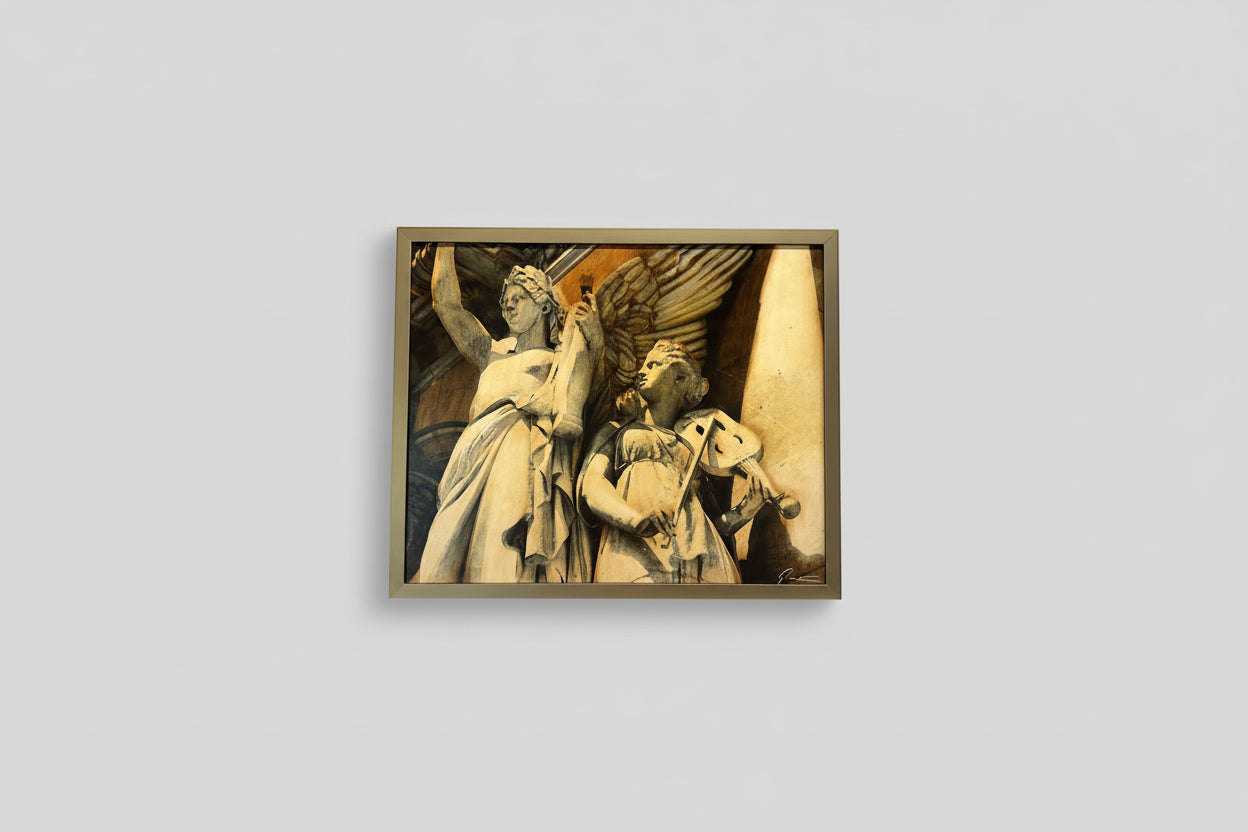 A framed artwork featuring a photo on a mixed media collage, depicting two individuals, displayed on a wall.