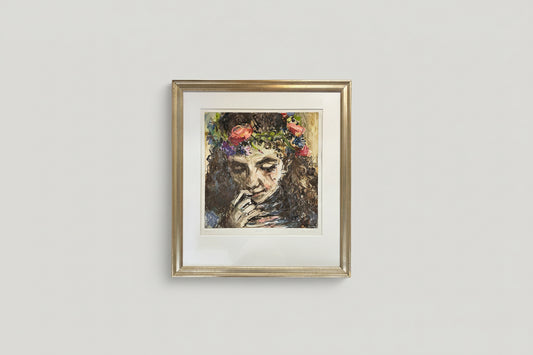 A framed monochrome artwork featuring a floral-themed design, displayed on a wall above a mirror with natural lighting.
