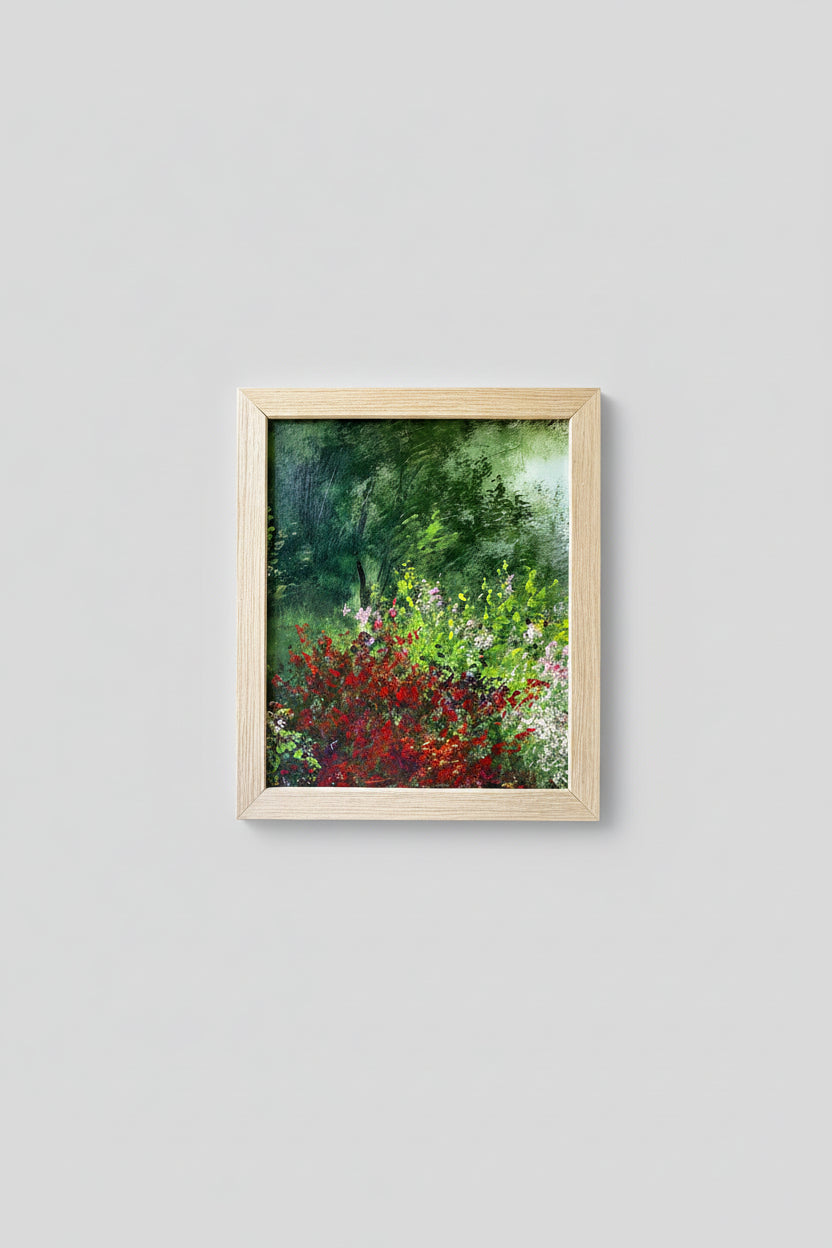 An oil on board painting titled 'The Garden Scene' depicting a vibrant garden with a custom wood frame, displayed on a wall.