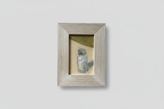 A painting titled 'Pass the Salt' displayed on a wall, featuring a salt shaker, framed in a simple grey frame.