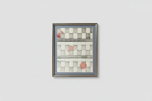 Framed pen and ink artwork hanging on a wall, depicting a grid-like pattern with some form of visual representation possibly in a different color or with markings.