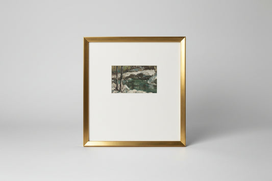 An oil on board painting depicting a winter river scene, framed in a gold frame, displayed against a wall with plants on either side.